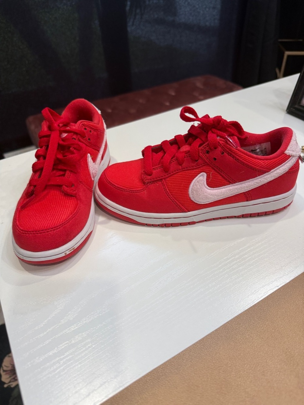 Nike Kids Red Low-Top Sneakers with White Swoosh